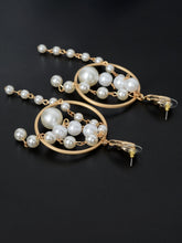 Load image into Gallery viewer, Dangling Pearl Earrings
